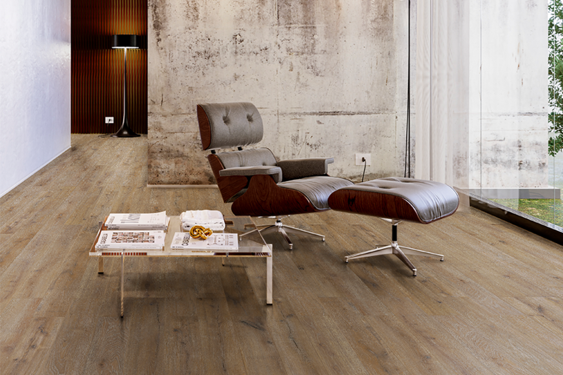 Stilvoller Wohnbereich mit Eco-Design Korkboden, moderner Lounge-Liege und Panoramafenster.